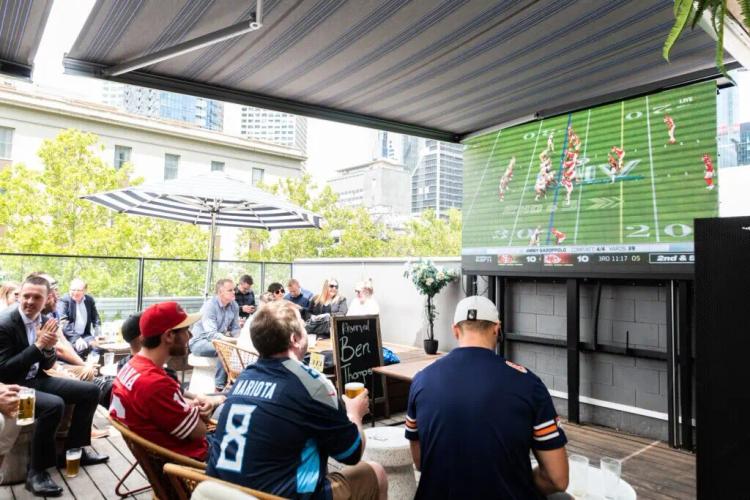 Browse pubs with outdoor screens, perfect for watching World Cup matches in the open air.